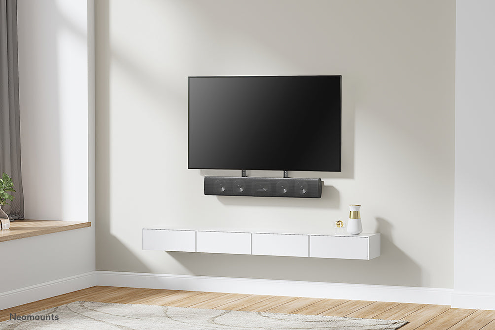 Neomounts AWL29-750BL1 universel videobar/soundbar/højttalerholder, dybdejusterbar (0-4,2 cm) - Sort