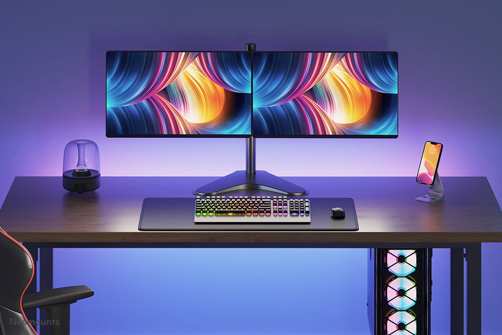 Neomounts FPMA-D550DD sort er en bordbeslag til 2 flatscreens op til 32 tommer.